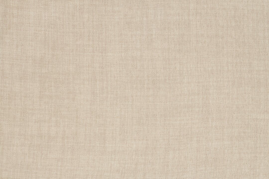 Brown linen fabric cloth texture for background, natural textile pattern.