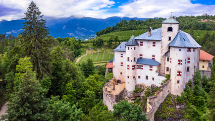 Scenic fairytale medieval castles of Italy - beautiful Castel Bragher in Trentino Alto Adige. surrounded by vineyards and forest. aerial drone view. - 762372363