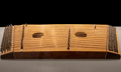 Santur or  santour, santoor. It is a stringed instrument originating from Iraq, Iran and India
