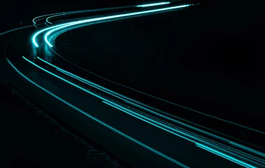 Papier Peint photo Autoroute dans la nuit blue car lights at night. long exposure