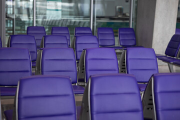 purple seats in airport lounge