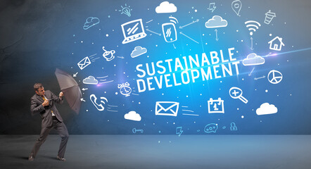 Businessman defending with umbrella, modern technology concept