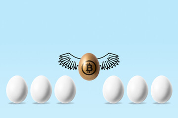 Golden egg with a bitcoin sign flying above white eggs on blue background. Minimal investment...