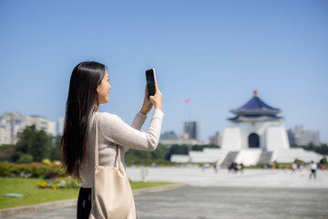 Tourist woman take photo on mobile phone in Chiang Kai shek Memorial Hall in Taipei of Taiwan - 762414169