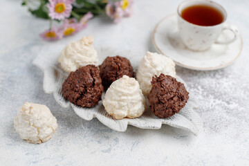 Delicious homemade meringue cookies with coconut flakes.