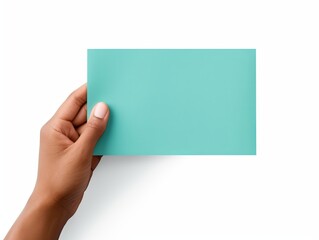 A hand holding a turquoise paper isolated on white background, elements, crisp and clean lines