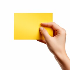 A hand holding a yellow paper isolated on white background