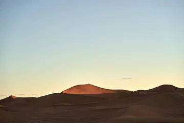 Fototapeten sunset in the desert © Ong