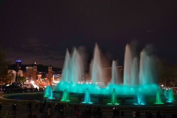 Fototapeta na wymiar a lot of people came to see magic fountain Montjuïc show Barcelona Spain at night one of travel destination 