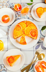 Orange cake with fruit citrus slices. Top view.