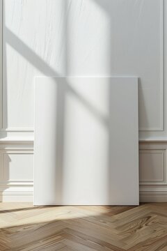 blank vertical  poster frame standing on light wooden laminate floor against a white wall, empty picture frame mockup, blank photo frame mock-up