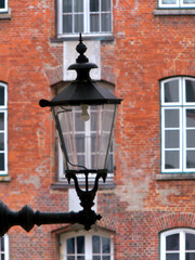 Fototapeta na wymiar Old street lamp on the wall