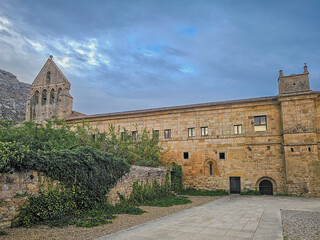 Facade of the monastery of Santa Maria la Real in Aguilar de Campoo, province of Palencia - 762453523