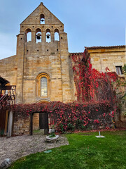 Facade of the monastery of Santa Maria la Real in Aguilar de Campoo, province of Palencia - 762453544