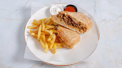 Chicken doner kebab and fries on plate