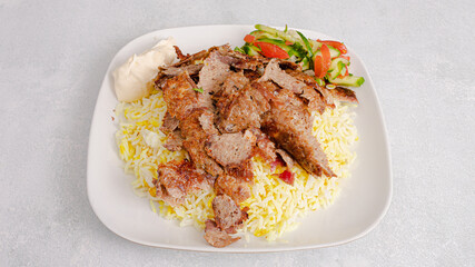 Beef portion rice doner kebab plate top view