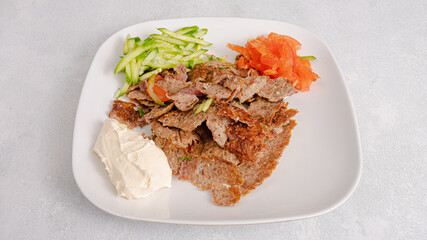 Beef portion doner kebab plate top view