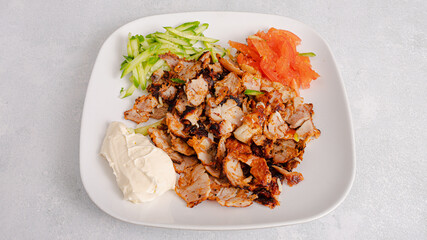 Chicken portion doner kebab plate top view