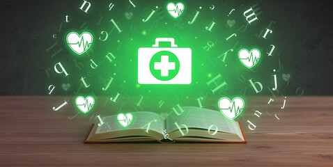 Open medical book with health icons above - 762459338