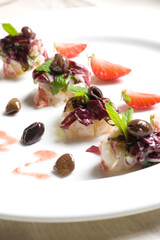 Grilled lobster medallions and Taggiasca olive salad