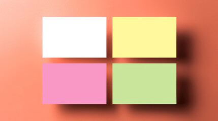 Fototapeta premium Organized stack of colored sticky notes on a gradient orange background with shadows