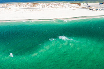 Pensacola Beach is a Florida resort community on the Gulf Coast barrier island of Santa Rosa. 
