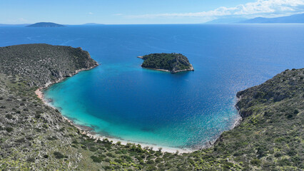 Aerial drone photo of small exotic island and secluded beach of Romvi next to famous seaside village of Tolo, Argolida, Peloponnese, Greece