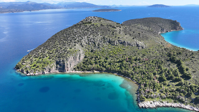 Aerial drone photo of small exotic island of Romvi next to famous long beach of Tolo, Argolida, Peloponnese, Greece
