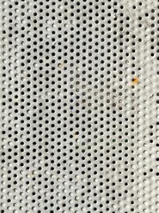 Grunge white painted perforated steel sheet metal with round circles texture overlay - 762509137