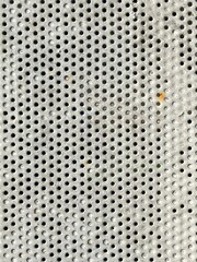 Grunge white painted perforated steel sheet metal with round circles texture overlay - 762509166