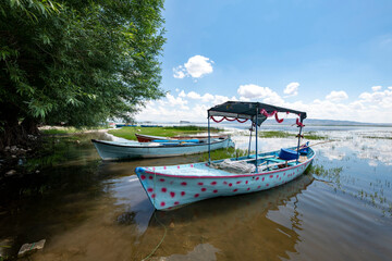 Decorated day-trip boats in Isikli Lake in Denizli's Civril district. Isıkli Lake is flooded with visitors during lotus time. It is also a popular lake for hunters.