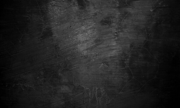 Black concrete texture as a concept of horror and Halloween. Dark wall background cement or stone.