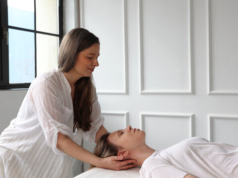 Somatic therapy, Osteopathy, Alexander technique session. Patient and body work therapist . Neck Pain Relief, Posture Correction concept