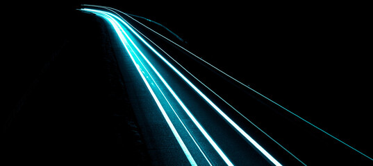 blue car lights at night. long exposure