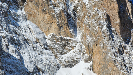 Cliff wall and close up structure of Dolomites rocks