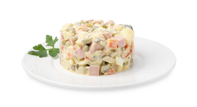 Tasty Olivier salad with boiled sausage isolated on white