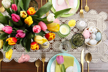 Festive table setting with beautiful flowers, flat lay. Easter celebration - obrazy, fototapety, plakaty