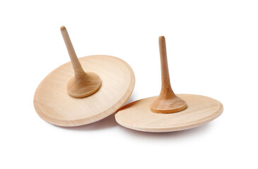 Two wooden spinning tops isolated on white