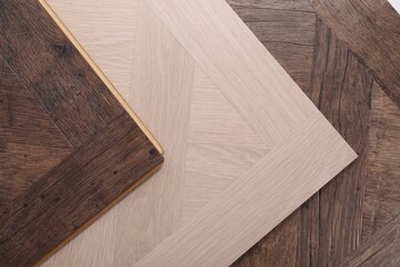 Samples of wooden flooring as background, top view - obrazy, fototapety, plakaty