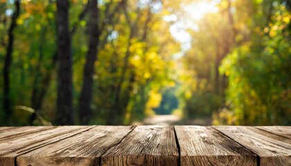 the empty rustic wooden table for product display with blur background of autumn forest exuberant image - obrazy, fototapety, plakaty