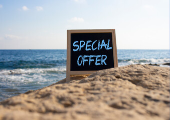 Special Offer symbol. Concept word Special Offer on black chalk background. Beautiful sea...