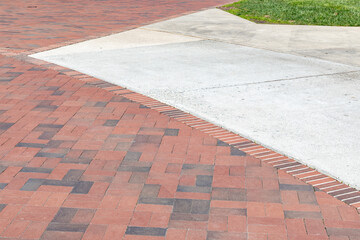 Broad paved area, part concrete and part brick, creative copy space, horizontal aspect