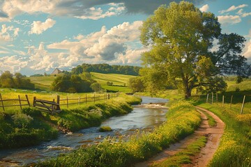The afternoon sun illuminates a serene countryside scene, highlighting a winding river, green pastures, and an old wooden fence, embodying the essence of pastoral life. - obrazy, fototapety, plakaty
