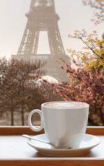 Cup of coffee against famous Eiffel Tower during spring in Paris, France - 762657119