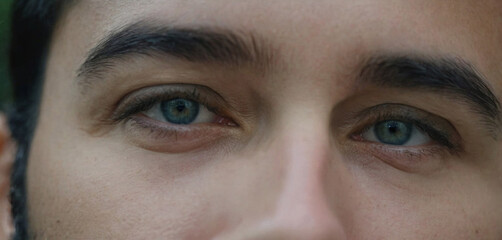 bad mood and dissatisfaction, close-up caucasian man, eyes and face, gloom and thoughtful - obrazy, fototapety, plakaty