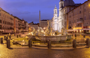 The famous fountains with tritons in Piazza Navona in Rome at dawn. - 762671788