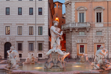 The famous fountains with tritons in Piazza Navona in Rome at dawn. - 762672154