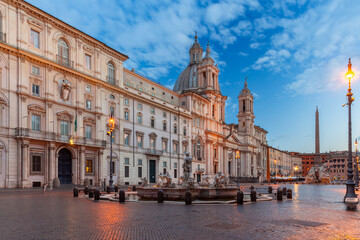 The famous fountains with tritons in Piazza Navona in Rome at dawn. - 762672364