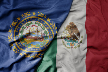 big waving realistic national colorful flag of new hampshire state and national flag of mexico .