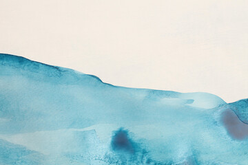 Ink watercolor hand drawn pour flow stain painting blot. Wave landscape on wet beige paper texture background.